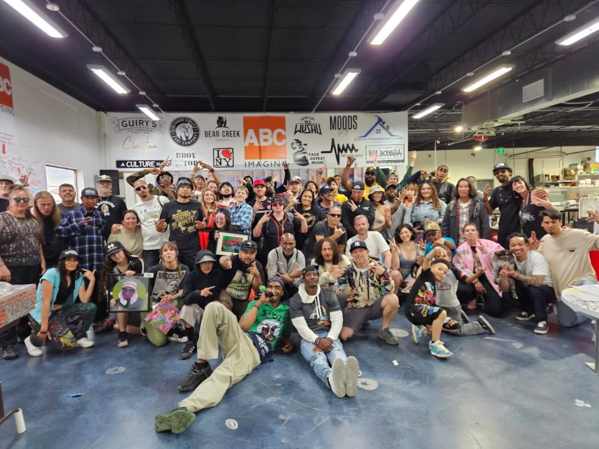 Community group photo at Hip-Hop Summit Denver 2025