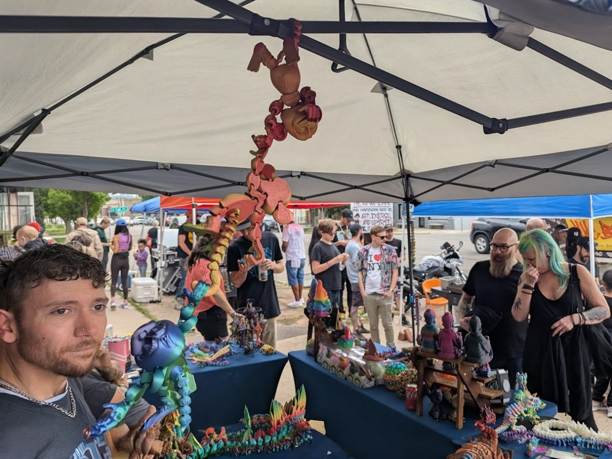 Packed vendor tables at Hip-Hop Summit Denver 2025